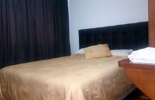 Quito Casa | The Quito Guest House with Yellow Balconies