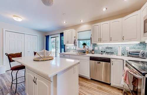 Cedar Neck Casa | The Reservation - dog-friendly home with fenced yard, deck, grill, & beach gear