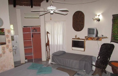 Thorny Bush Game Reserve Casa | El renovado rondawel junto al río Kruger Park Type con cocina y TV satelital