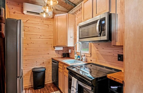 Hayesville Casa | The Ritz Carlton of Tiny Cabins w/ Hot Tub / Fire Pit table