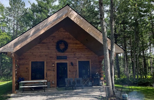 South Boardman Cabina | The Shire, a fun cabin retreat. Warm and cozy, nestled trailside in the woods.