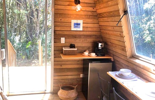 Guarne Cabina | The Shire Glamping - nestled among lush trees, tranquil atmosphere