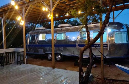 Austin Casa | The Steel Magnolia Airstream - Cabins At Rim Rock