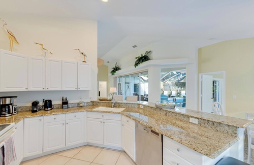 Central Naples Villa | The Terrazzo Home – Breezy Coastal Style Pool Retreat in Quiet Briarwood, Naples