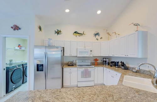 Central Naples Villa | The Terrazzo Home – Breezy Coastal Style Pool Retreat in Quiet Briarwood, Naples