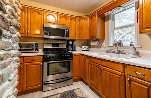 Akron Casa | The Total Package! Few Can Match This Property! 3 Bed, 1.5 Bath with Security, Private Fenced Back Yard, New Central Air