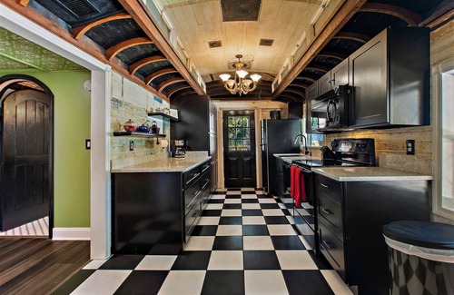 New Smyrna Beach Casa | The TRAIN House 3/2 with WiFi, AC in delightful New Smyrna Beach, deck, grill,yd