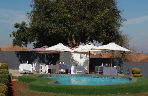 Lobamba Cama Y Desayuno | The White House Lodge