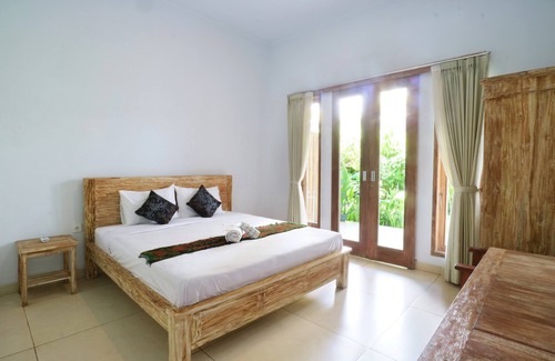 Batu Bolong Hotel | The Wina Guesthouse 2