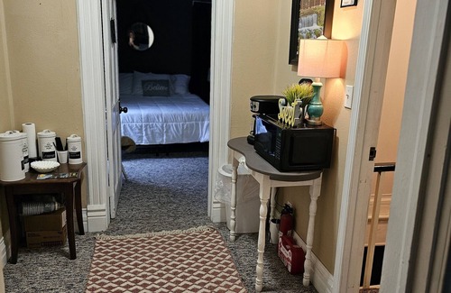 Eminence Otro | The Woods and Willow Room. 2 queen beds and grab-n-go breakfast items