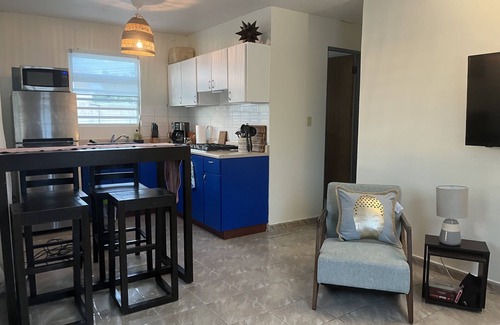 Gobernador Pinero Apartamento | The Yellow Door Casita A/C, Parking, Private Balcony & more