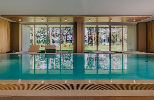 Bad Saarow Apartamento | TheChipp - Designapartment mit Seeblick, Pool, Sauna & Kamin