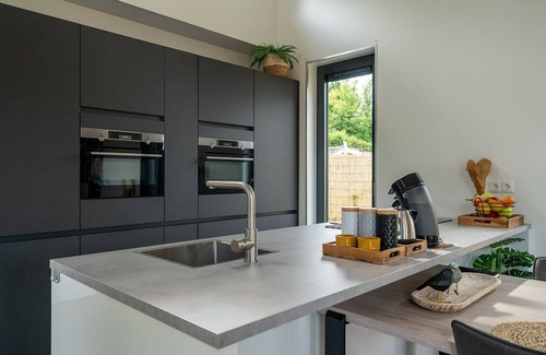Ouddorp Casa | This attractively furnished holiday home with a large terrace, is located on a quiet family park and close to the sea and beach.