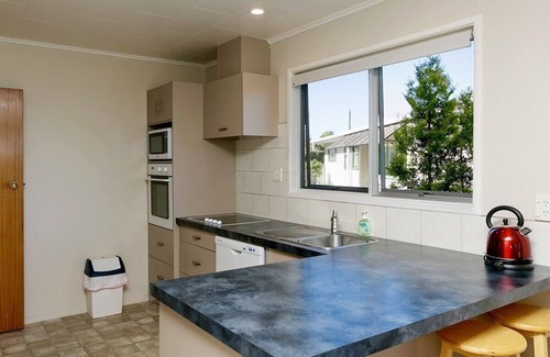 Taupo Cabaña | Este Bach lo tiene todo - Rainbow Point Holiday Home