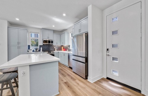 Irvine Casa | this newly built, fully furnished tri-level home awaits your arrival.