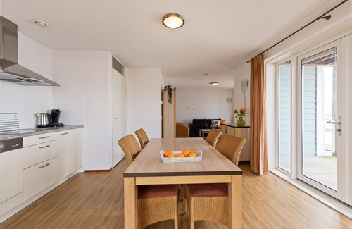 Municipality of Hellevoetsluis Apartamento | This nice 4-pers. corner-apartment on the 1st floor with unique harbor view near the beach.