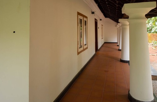 Thrissur Villa | Esta propiedad es una casa de patrimonio de 200 años de antigüedad.