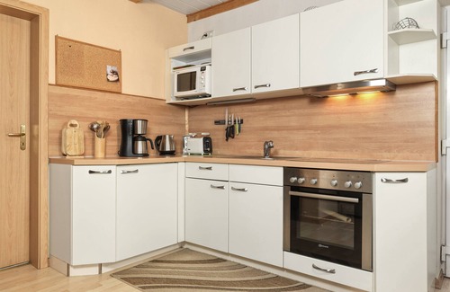 Kaltenhof Casa | This semi-detached holiday home is located on a plot of over 600m², fenced in wi