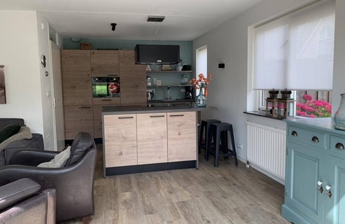 Breskens Casa | This spacious detached bungalow, type Schelde, for 8 persons with a spacious garden, on the water, has been completely renovated.