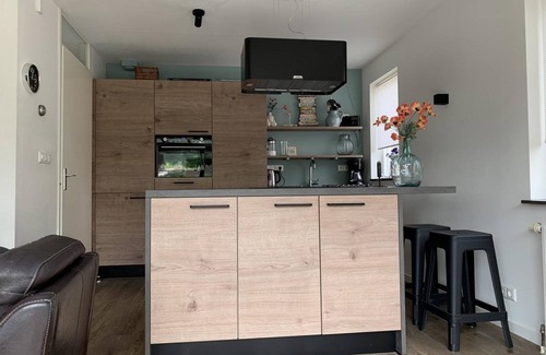 Breskens Casa | This spacious detached bungalow, type Schelde, for 8 persons with a spacious garden, on the water, has been completely renovated.