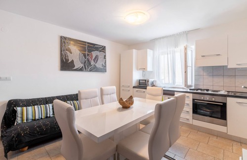 Lopar Apartamento | Apartamento de tres habitaciones con balcón y vista al mar Lopar, Rab (A-14070-d)