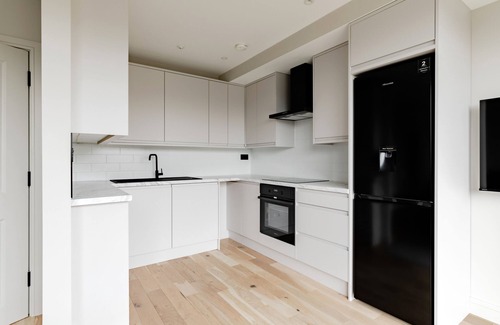 Swiss Cottage Apartamento | Apartamento-Baño con bañera-Balcón