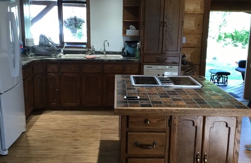Swift Current Casa | Three level Log Home on Private 40 Acre Estate.