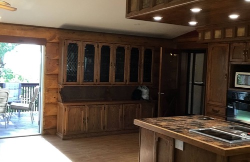 Swift Current Casa | Three level Log Home on Private 40 Acre Estate.