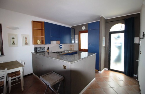 Porto Pollo Apartamento | Apartamento con gran vista y terraza con jardín y barbacoa