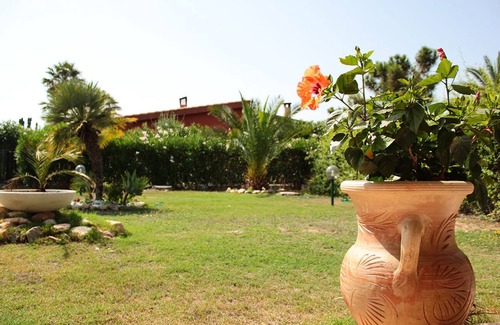 Costa Rei Villa | Casa de apartamentos de tres habitaciones a 50 metros de la playa, todos los servicios en la puerta.