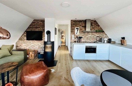 Wittduen Apartamento | TIDE4 Amrum No. 7 - Modern apartment with wood-burning stove. 100m to the sea. Dogs welcome!