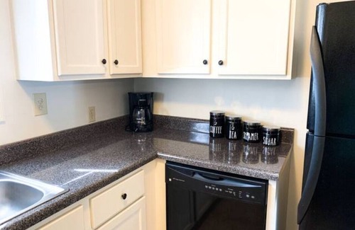 Auburn Condominio | Tiger Paw 1