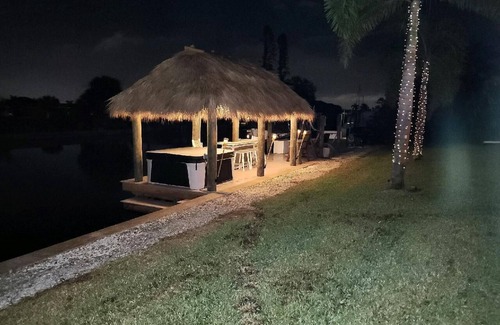 Edgewater Casa | Tiki Hut/Hot Tub Canal w/Gulf Access, Heated Pool Lanai 12 min. to PGD Airport