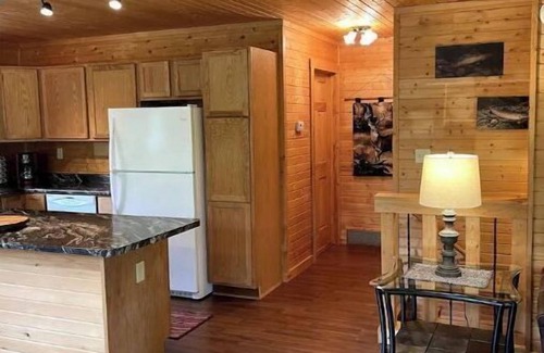 Westby Casa | Timber Coulee Creek in backyard, king size bed, grill on deck, large garage.