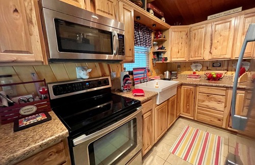 West Jefferson Casa | Tiny Ashe Cabin-Riverfront, Firepit, Kayaks, Wifi, Small Dog Friendly, Grill