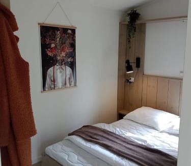 Nunspeet Otro | Tiny cabin in bosrijke omgeving de Veluwe - met terras, tuin en fietsschuurtje