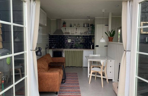 Burgerbrug Cabaña | Tiny house with green private garden near the beach