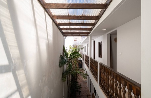 Old San Juan Chalet De Esquí | Tizol Historic Building: 8BR in Old San Juan