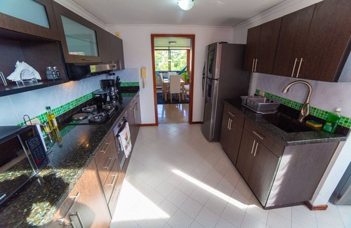 Guayabal Apartamento | Top floor apt w/Balcony in El Poblado, 1 minute walk to SantaFe Mall!!