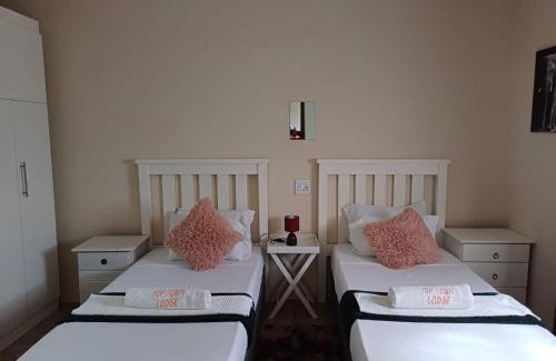 Mnquma Cama Y Desayuno | TOP TOWN LODGE