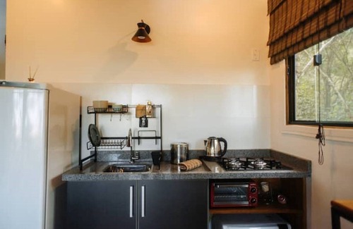 Garopaba Casa | Tourmaline studio, views of the sea, dunes and lagoon.