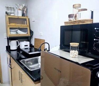 Santo Cristo Casa | Tower 5-2551 K3Staycations at The Grass Residences