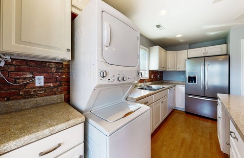 Cedar Neck Casa | Town of Ocean View canal-front home with dock, kayaks, balconies, grill, & AC