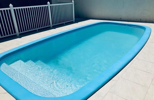 Barra de Ibiraquera Apartamento | Townhouse composta por 4 triplex duas suítes a duas quadras do mar