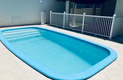 Barra de Ibiraquera Apartamento | Townhouse composta por 4 triplex duas suítes a duas quadras do mar
