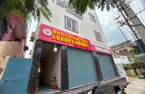 Karimnagar Hotel | Townhouse SP Living Tree