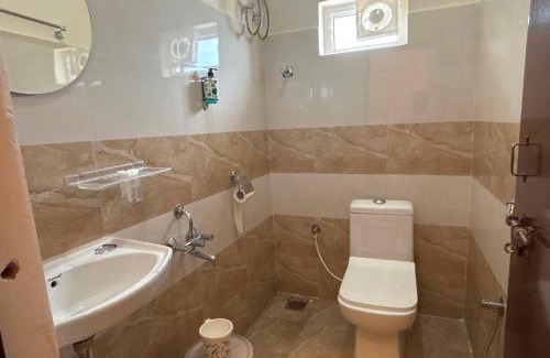 Karimnagar Hotel | Townhouse SP Living Tree