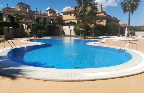 Calas de Mallorca Casa | Adosado con piscina y jacuzzi comunitario, situado a escasos metros de la playa.