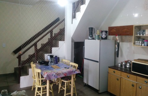 Balneario Arpoador Casa | Casa adosada con piscina a 500 metros de la playa con wifi gratis y TV por cable.