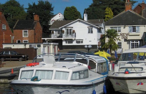 Irstead Casa | Tracara in Horning, riverside location sleeps 8. Family & Pet friendly.